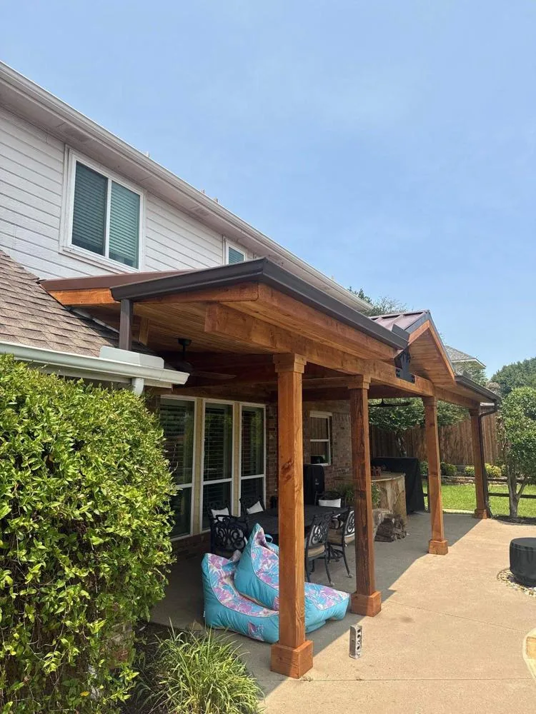 Gable patio cover beside a swimming pool